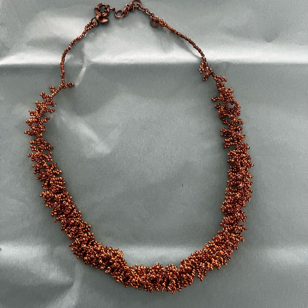 Elegant gold-bronze Necklace